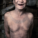 Hensungaubu, 80, shows off his traditional blackened teeth.